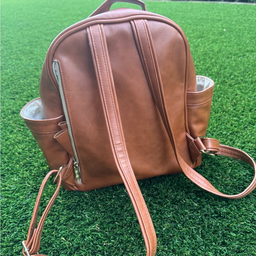 Itzy Ritzy Brown Faux Leather Baby Backpack - Picture 3 of 11